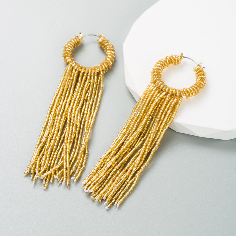 Long tassel earrings and colorful rice bead earrings